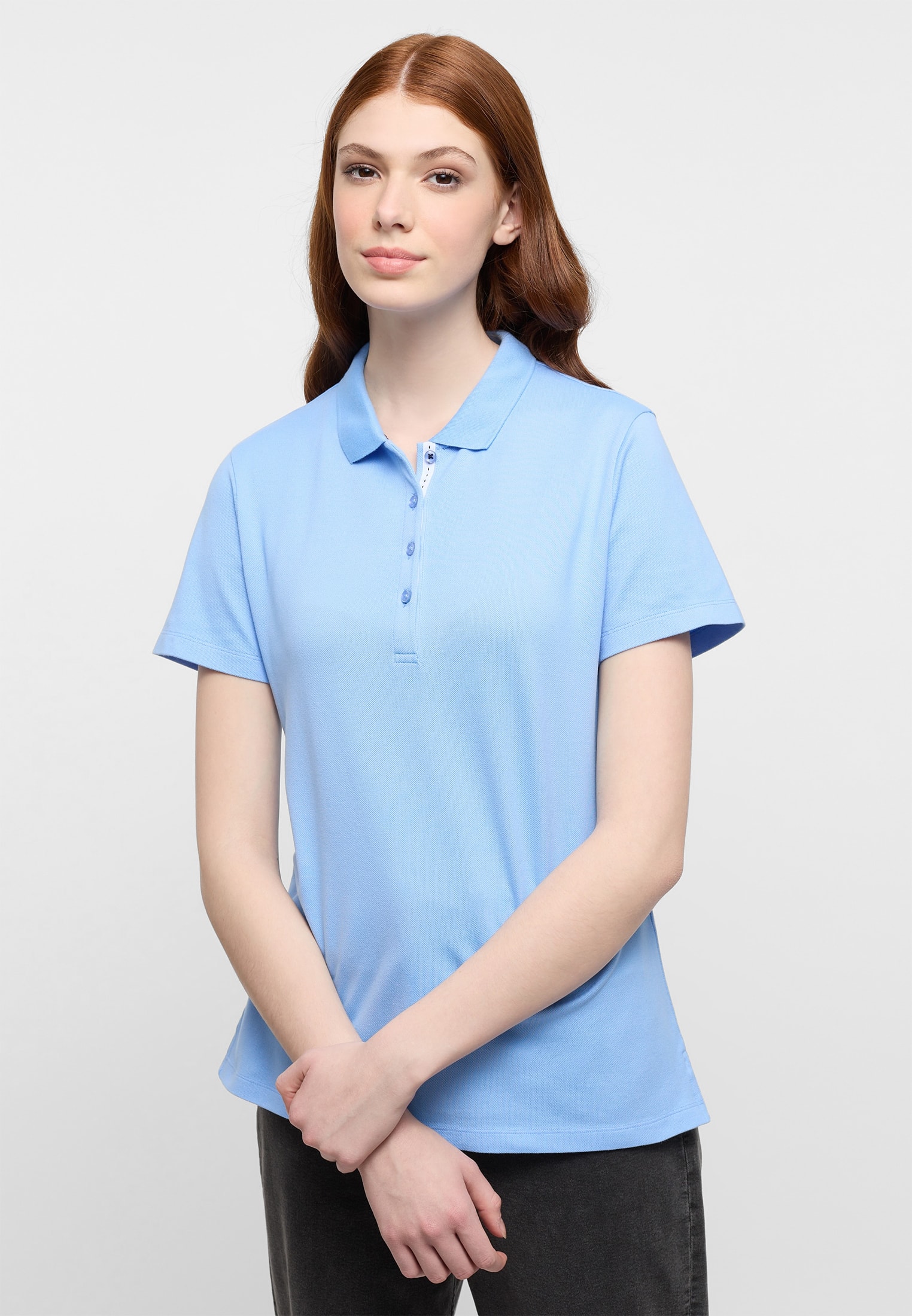 Poloshirt in lyseblå vlakte